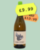 Natural white wine with illustrated pig on the label.  Pen illustration of pig with dollar notes in its mouth. 