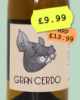 Natural white wine with pig on the label